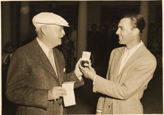 Donald Ross presents Ben Hogan with a medal after one of Hogan's three victories in the prestigious North & South Open.