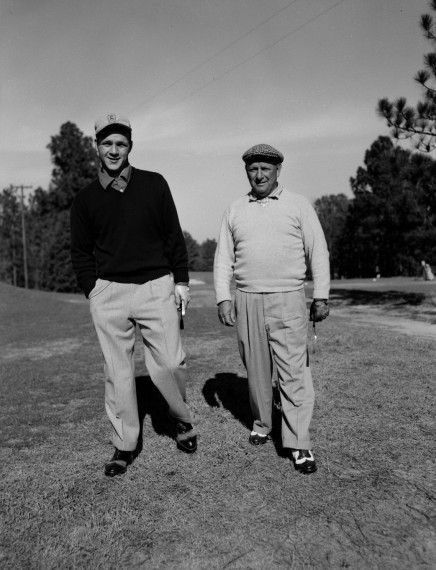 Arnold Palmer and his father Deacon, on the 9th hole of Pinehurst No. 2 in 1954. Photo Courtesy of the Tufts Archives